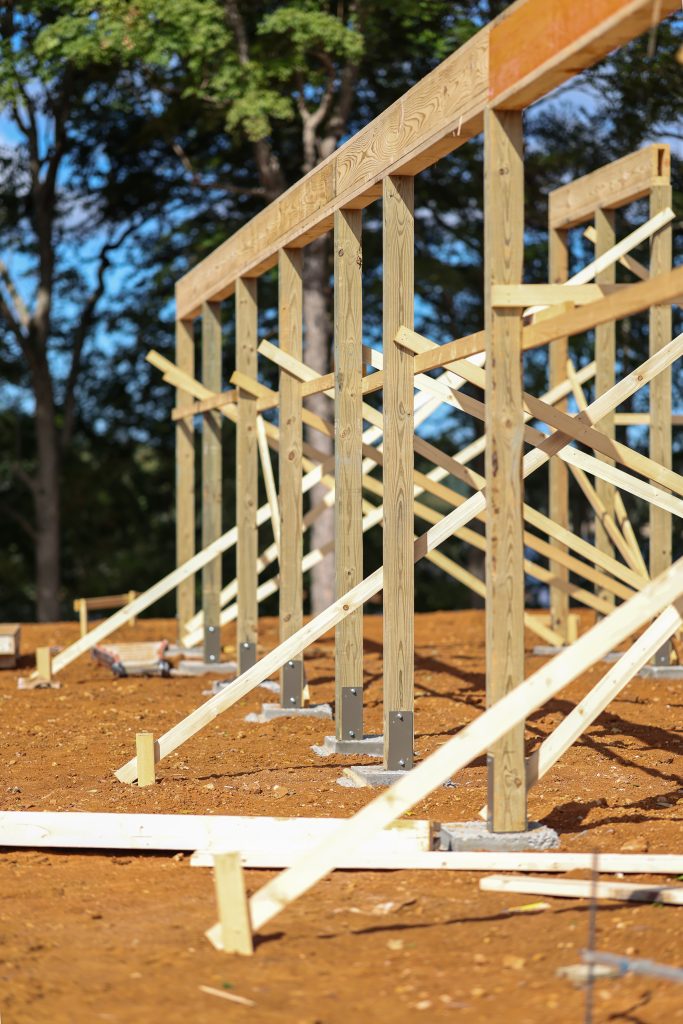 Posts of a pole barn under construction